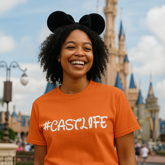 Person wearing an '#CASTLIFE' t-shirt with a castle in the background